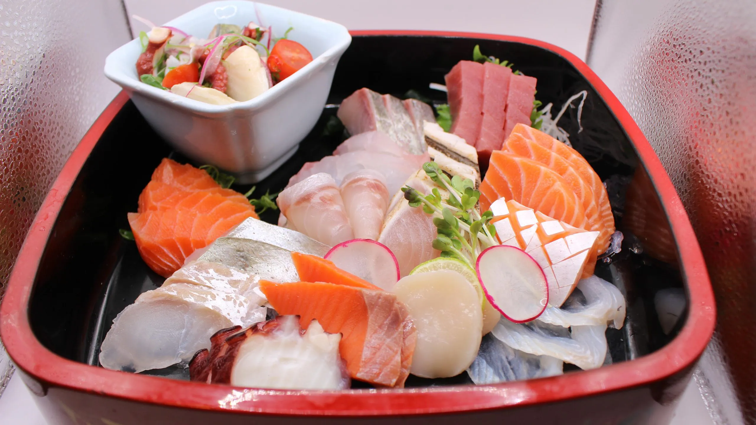 It's a sashimi platter at Kokoro Sushi, a Japanese restaurant in CA